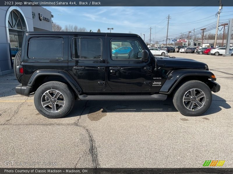 Black / Black 2023 Jeep Wrangler Unlimited Sahara 4x4