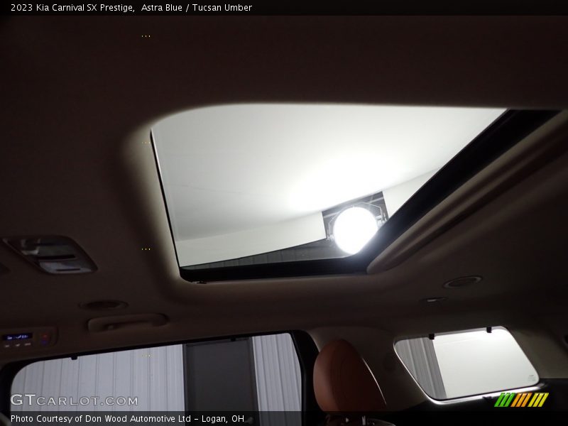 Astra Blue / Tucsan Umber 2023 Kia Carnival SX Prestige
