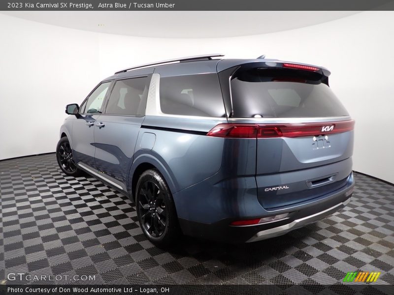 Astra Blue / Tucsan Umber 2023 Kia Carnival SX Prestige