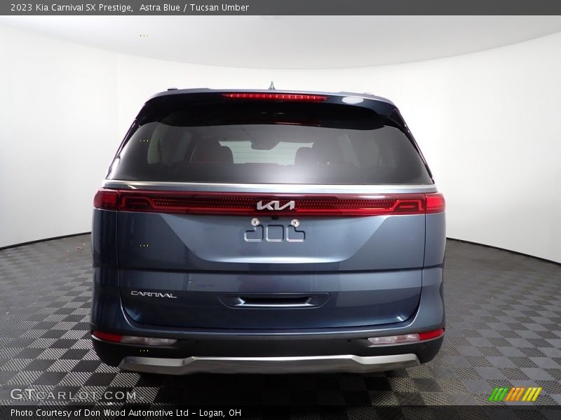 Astra Blue / Tucsan Umber 2023 Kia Carnival SX Prestige