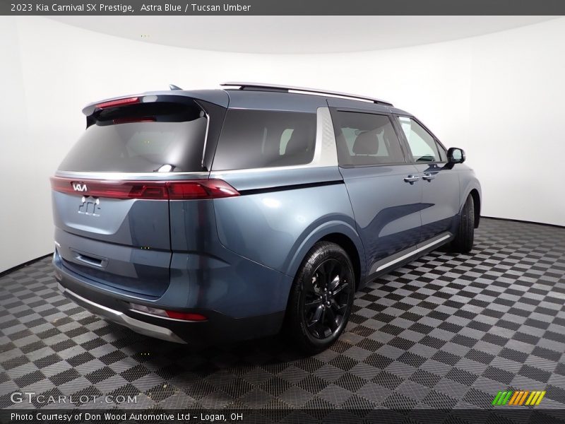 Astra Blue / Tucsan Umber 2023 Kia Carnival SX Prestige