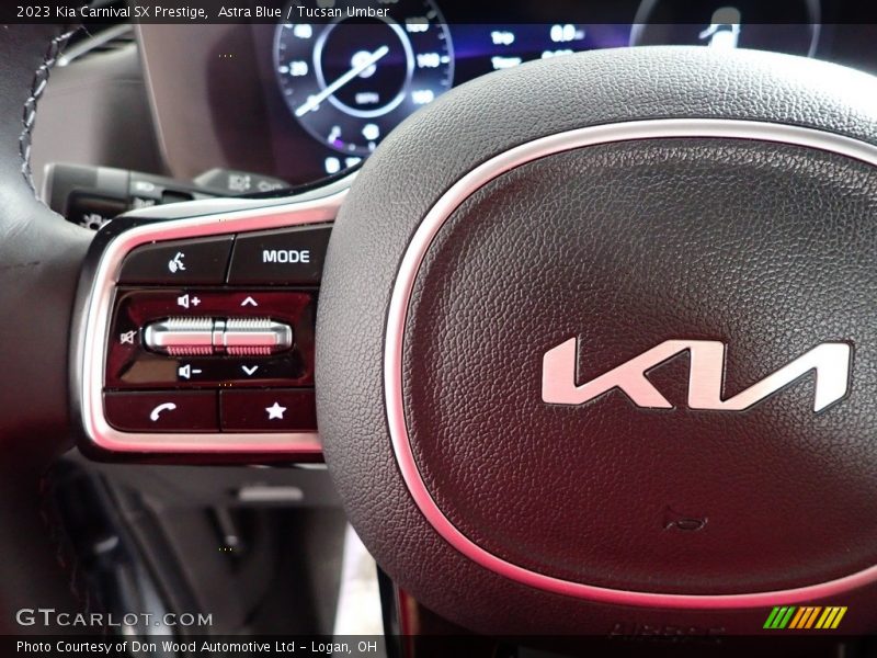 Astra Blue / Tucsan Umber 2023 Kia Carnival SX Prestige
