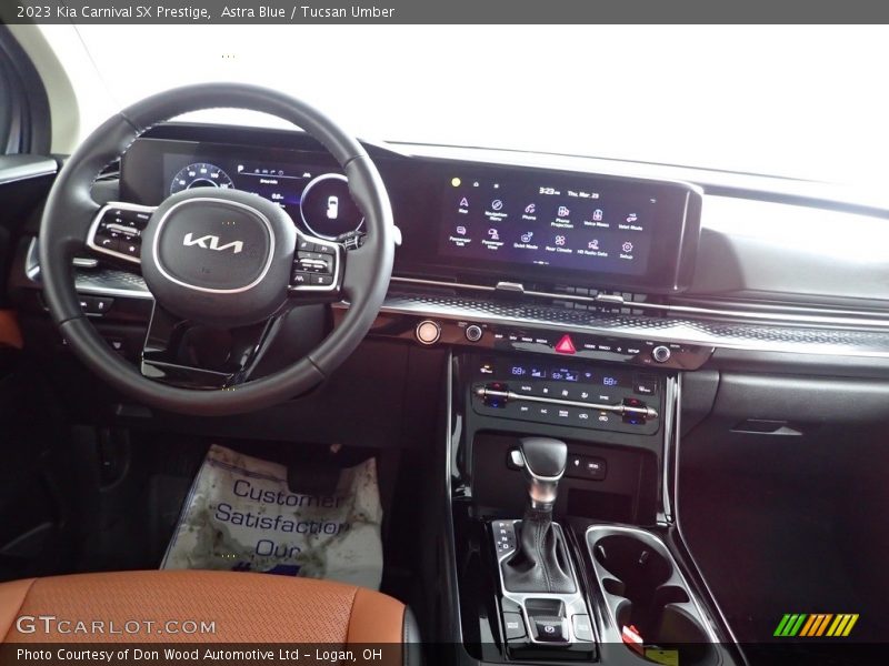 Astra Blue / Tucsan Umber 2023 Kia Carnival SX Prestige