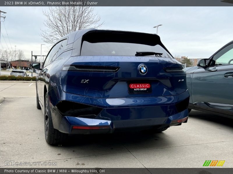 Phytonic Blue Metallic / Oyster 2023 BMW iX xDrive50