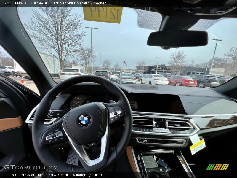 Black Sapphire Metallic / Cognac 2023 BMW X5 xDrive40i