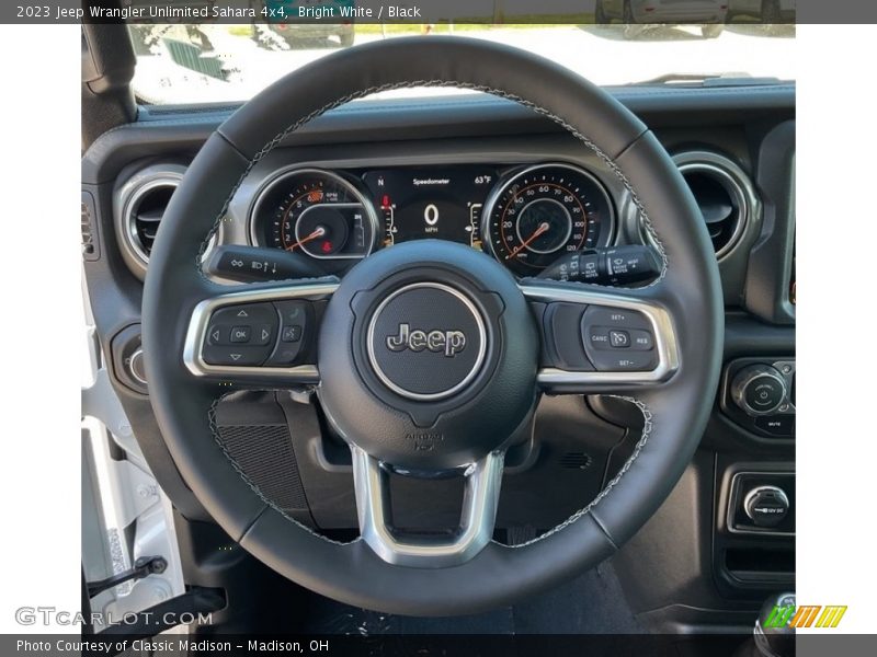 Bright White / Black 2023 Jeep Wrangler Unlimited Sahara 4x4