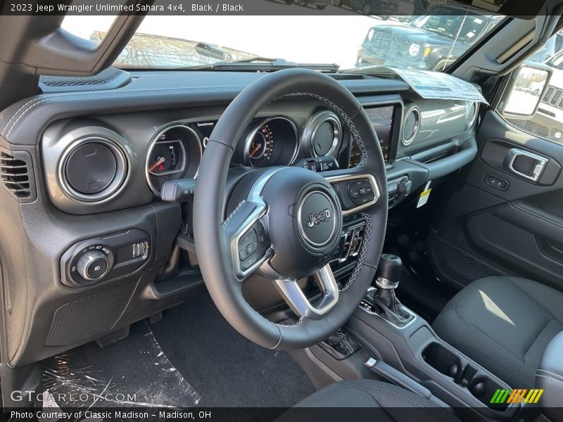Black / Black 2023 Jeep Wrangler Unlimited Sahara 4x4