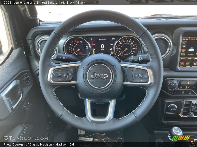Black / Black 2023 Jeep Wrangler Unlimited Sahara 4x4