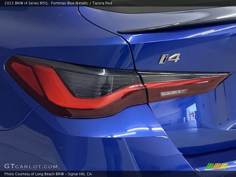 Portimao Blue Metallic / Tacora Red 2023 BMW i4 Series M50
