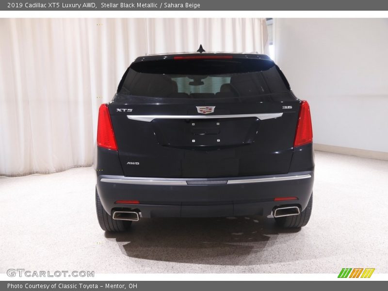Stellar Black Metallic / Sahara Beige 2019 Cadillac XT5 Luxury AWD