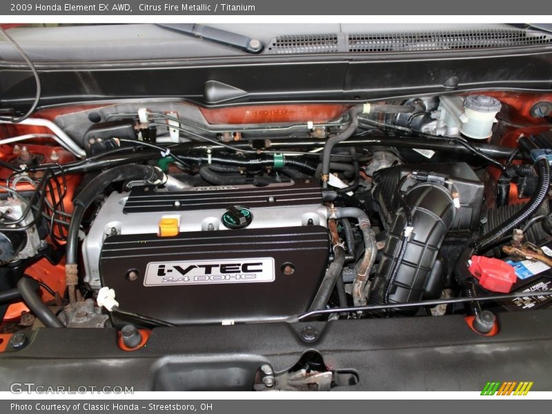 Citrus Fire Metallic / Titanium 2009 Honda Element EX AWD
