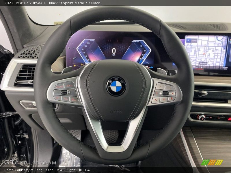 Black Sapphire Metallic / Black 2023 BMW X7 xDrive40i