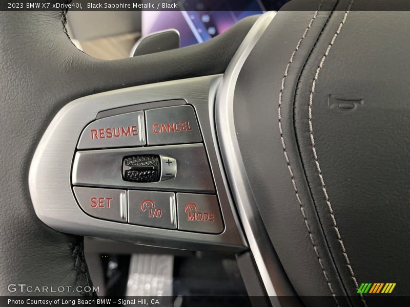 Black Sapphire Metallic / Black 2023 BMW X7 xDrive40i