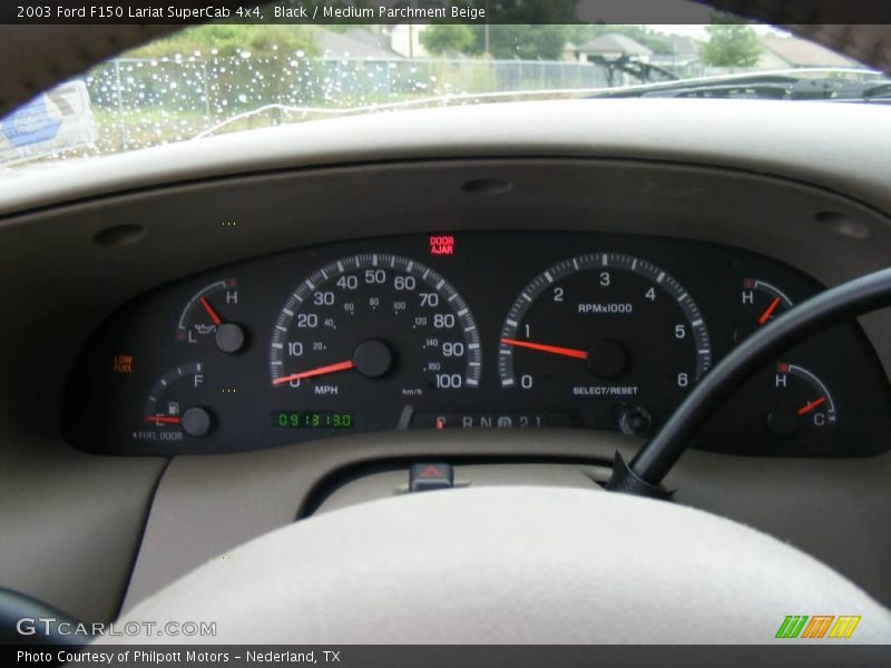Black / Medium Parchment Beige 2003 Ford F150 Lariat SuperCab 4x4