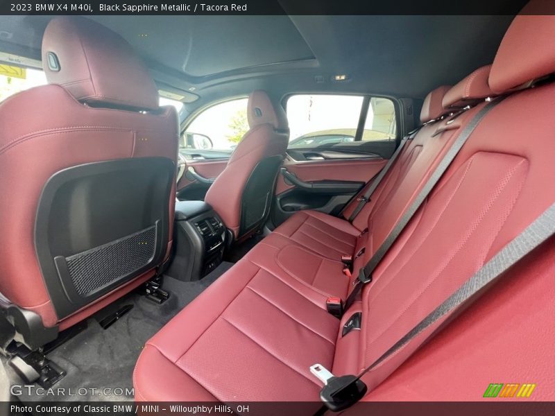 Black Sapphire Metallic / Tacora Red 2023 BMW X4 M40i