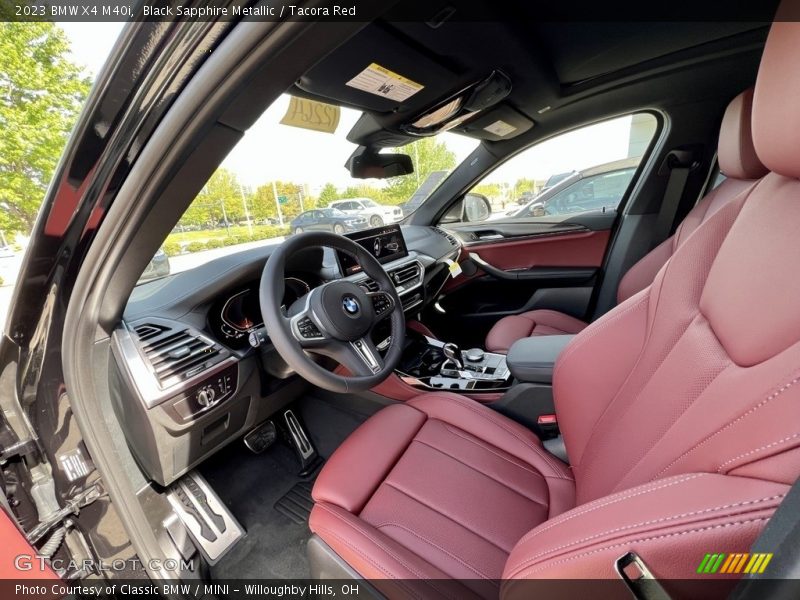 Black Sapphire Metallic / Tacora Red 2023 BMW X4 M40i