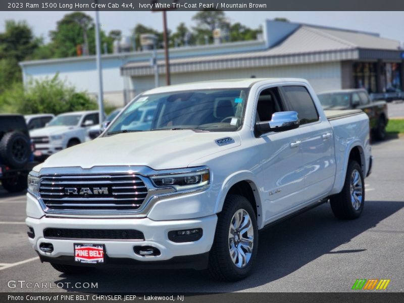 Ivory White Tri-Coat Pearl / Mountain Brown 2023 Ram 1500 Long Horn Crew Cab 4x4