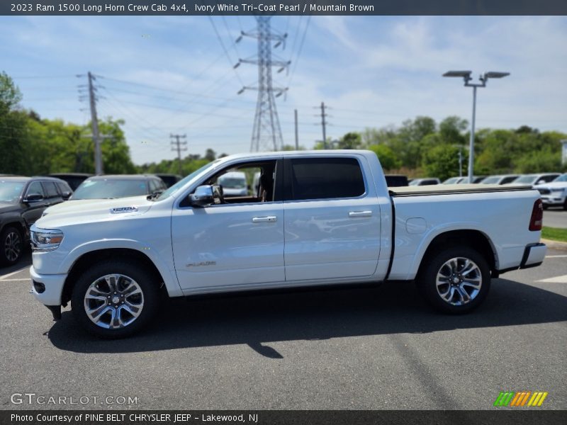 Ivory White Tri-Coat Pearl / Mountain Brown 2023 Ram 1500 Long Horn Crew Cab 4x4