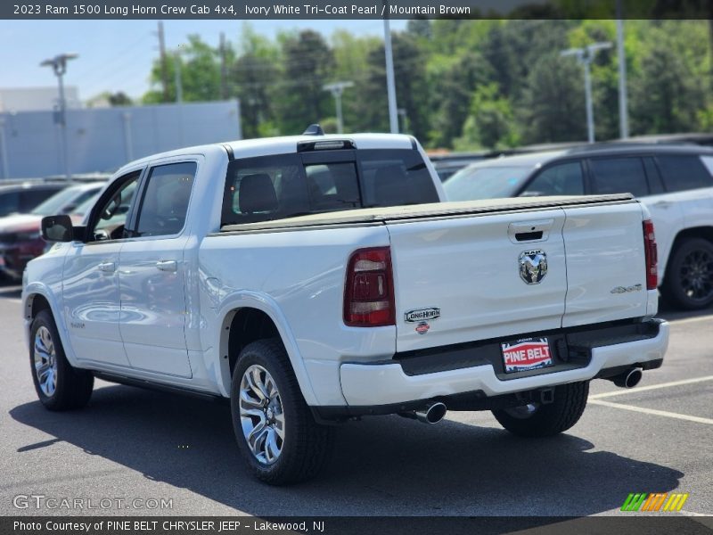 Ivory White Tri-Coat Pearl / Mountain Brown 2023 Ram 1500 Long Horn Crew Cab 4x4