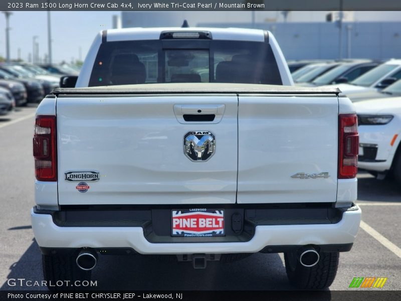 Ivory White Tri-Coat Pearl / Mountain Brown 2023 Ram 1500 Long Horn Crew Cab 4x4