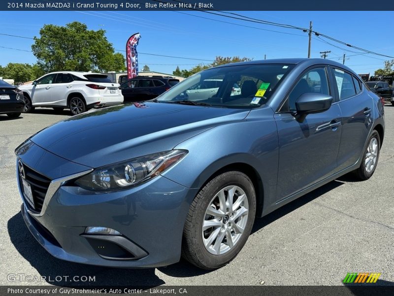 Front 3/4 View of 2014 MAZDA3 i Grand Touring 4 Door