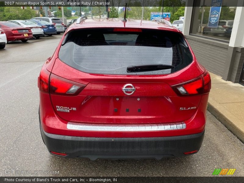 Palatial Ruby / Charcoal 2017 Nissan Rogue Sport SL AWD