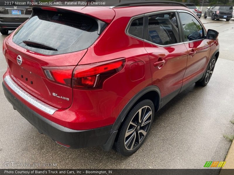 Palatial Ruby / Charcoal 2017 Nissan Rogue Sport SL AWD