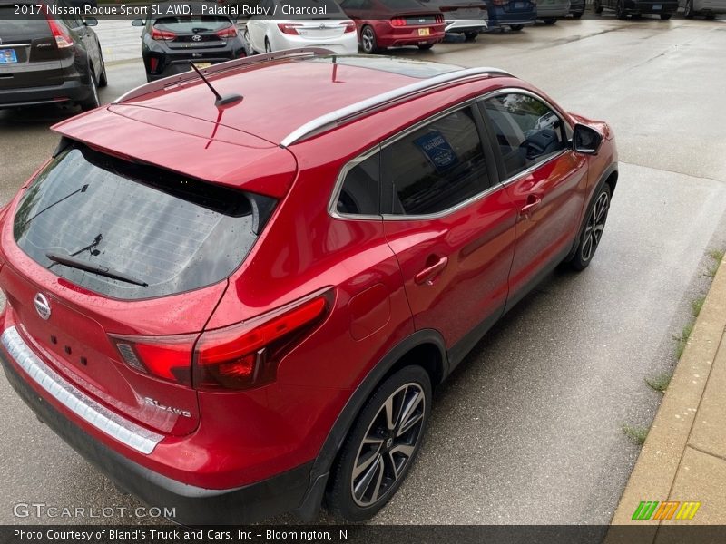 Palatial Ruby / Charcoal 2017 Nissan Rogue Sport SL AWD