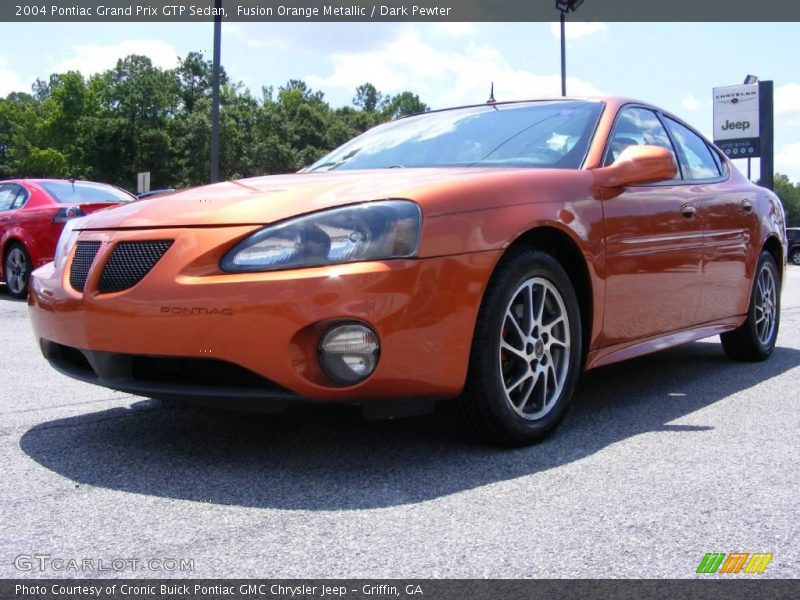 Fusion Orange Metallic / Dark Pewter 2004 Pontiac Grand Prix GTP Sedan