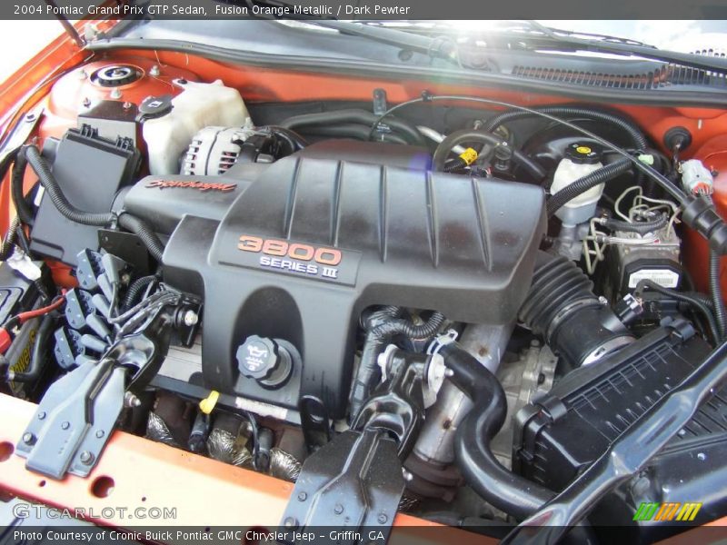 Fusion Orange Metallic / Dark Pewter 2004 Pontiac Grand Prix GTP Sedan