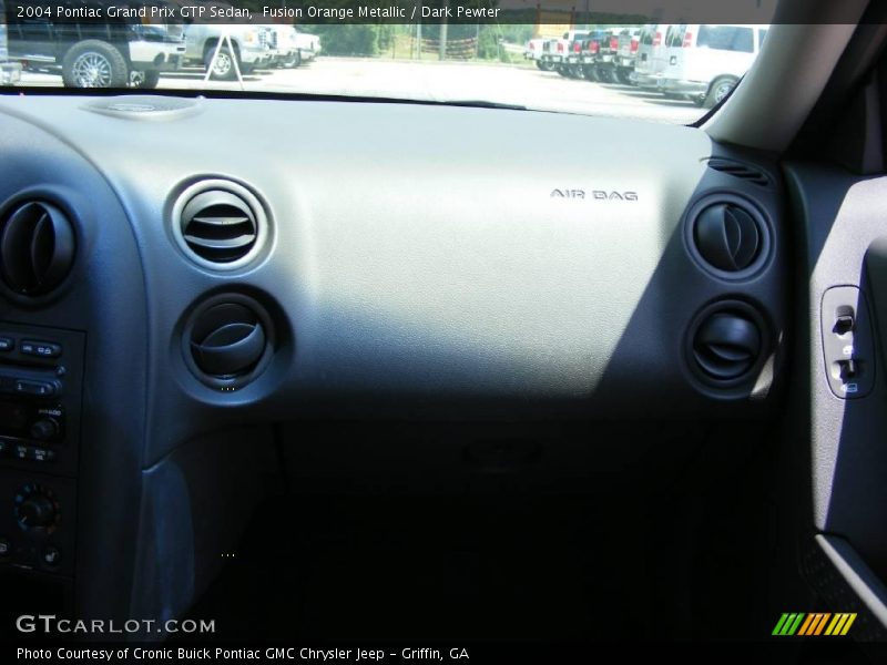 Fusion Orange Metallic / Dark Pewter 2004 Pontiac Grand Prix GTP Sedan