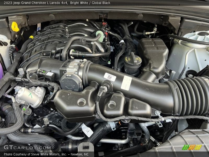 Bright White / Global Black 2023 Jeep Grand Cherokee L Laredo 4x4