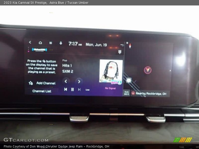 Astra Blue / Tucsan Umber 2023 Kia Carnival SX Prestige