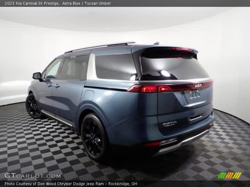 Astra Blue / Tucsan Umber 2023 Kia Carnival SX Prestige