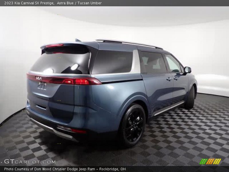 Astra Blue / Tucsan Umber 2023 Kia Carnival SX Prestige