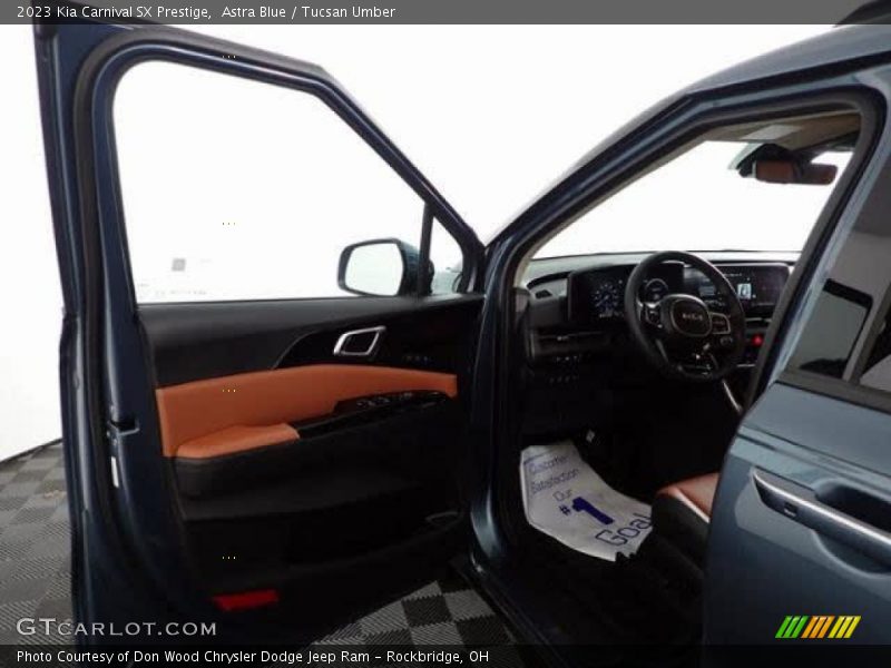 Astra Blue / Tucsan Umber 2023 Kia Carnival SX Prestige