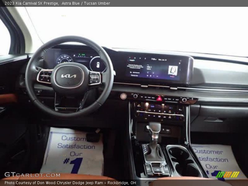 Astra Blue / Tucsan Umber 2023 Kia Carnival SX Prestige