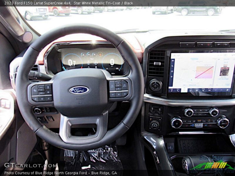 Star White Metallic Tri-Coat / Black 2023 Ford F150 Lariat SuperCrew 4x4