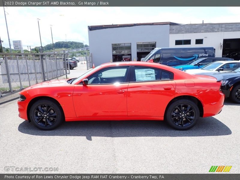 Go Mango / Black 2023 Dodge Charger SXT AWD Blacktop