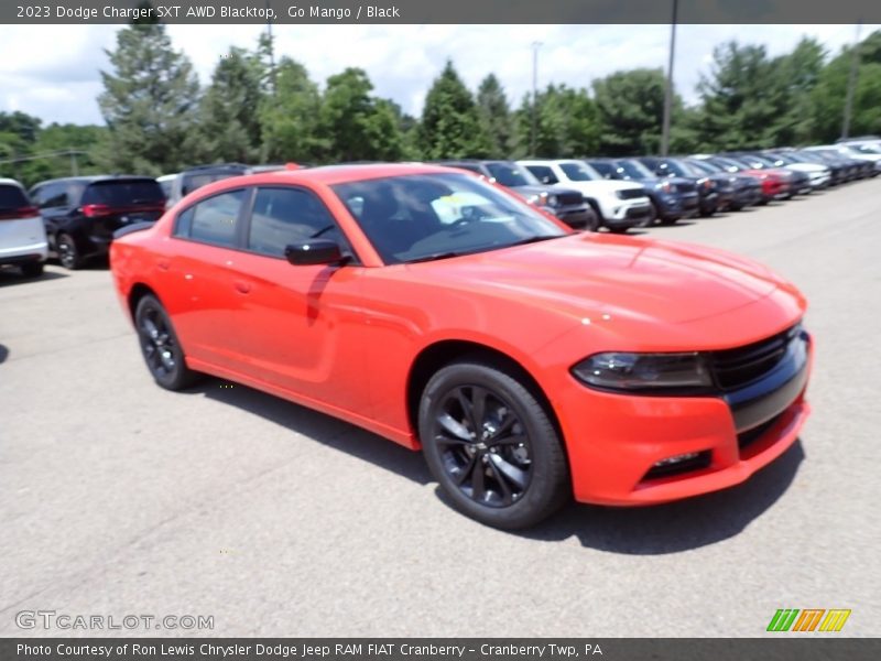 Go Mango / Black 2023 Dodge Charger SXT AWD Blacktop
