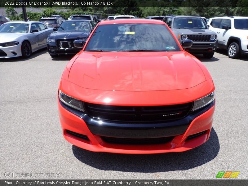 Go Mango / Black 2023 Dodge Charger SXT AWD Blacktop