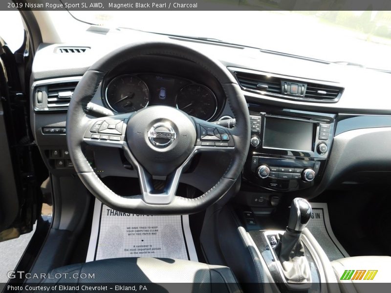 Magnetic Black Pearl / Charcoal 2019 Nissan Rogue Sport SL AWD