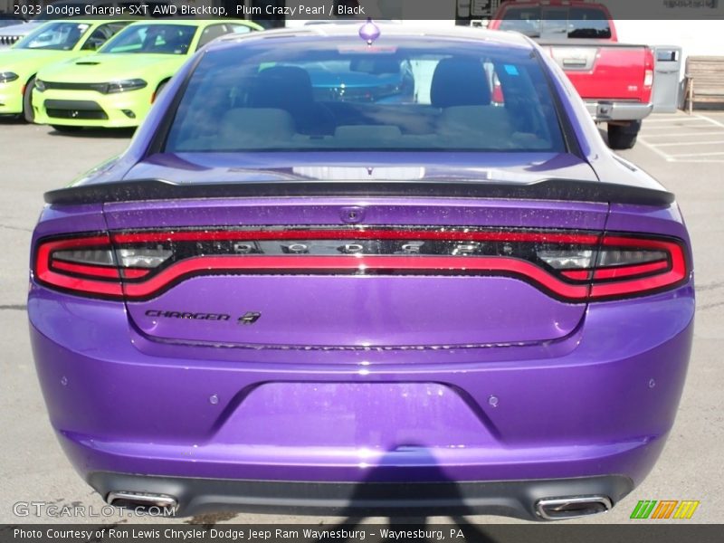 Plum Crazy Pearl / Black 2023 Dodge Charger SXT AWD Blacktop