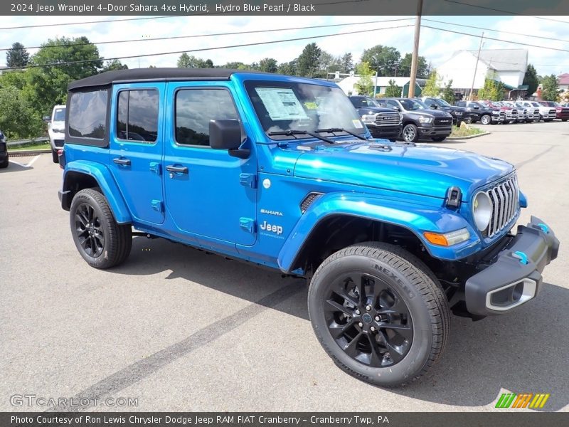 Front 3/4 View of 2024 Wrangler 4-Door Sahara 4xe Hybrid