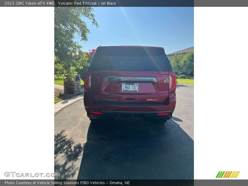 Volcanic Red Tintcoat / Jet Black 2023 GMC Yukon AT4 4WD