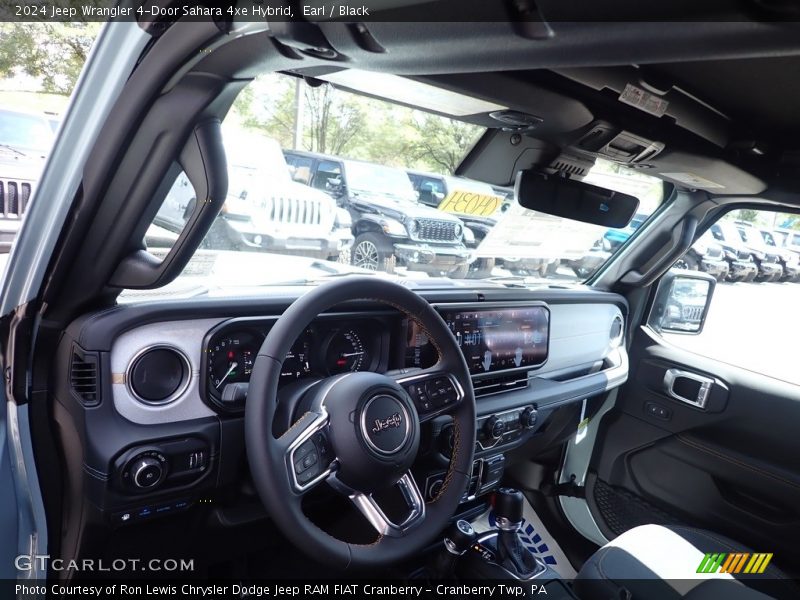 Earl / Black 2024 Jeep Wrangler 4-Door Sahara 4xe Hybrid
