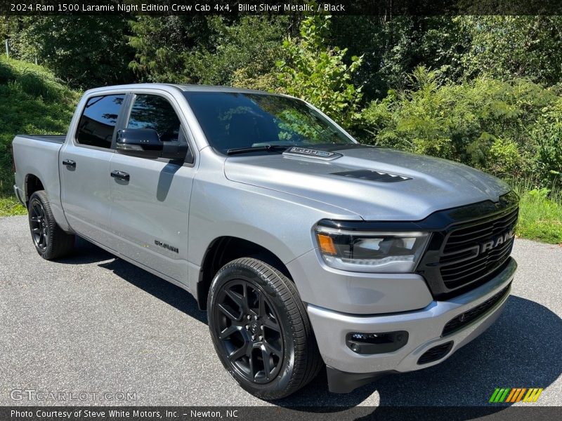 Front 3/4 View of 2024 1500 Laramie Night Edition Crew Cab 4x4