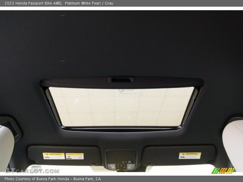 Platinum White Pearl / Gray 2023 Honda Passport Elite AWD