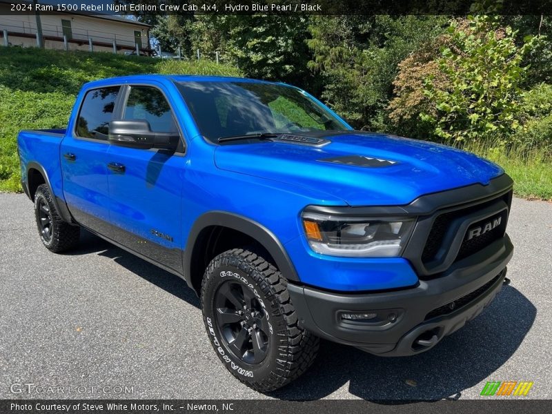 Front 3/4 View of 2024 1500 Rebel Night Edition Crew Cab 4x4