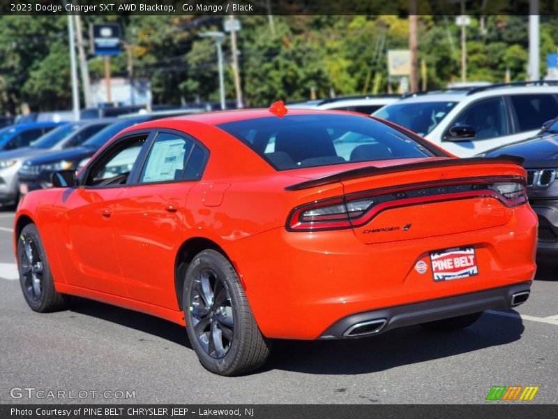 Go Mango / Black 2023 Dodge Charger SXT AWD Blacktop